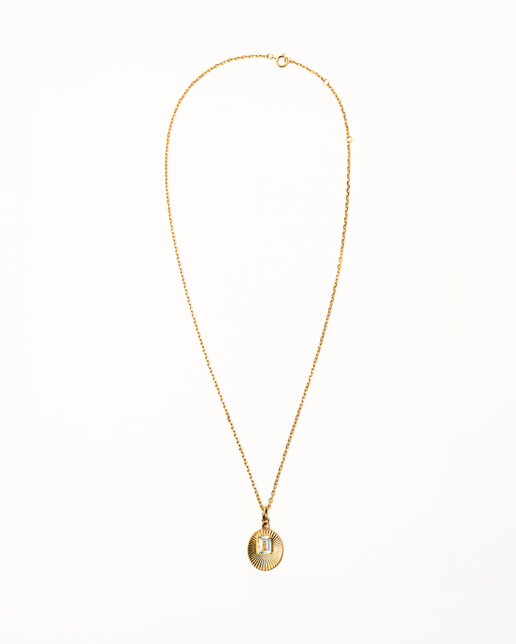 Full view of VERAE blue topaz and tourmaline pendant necklace