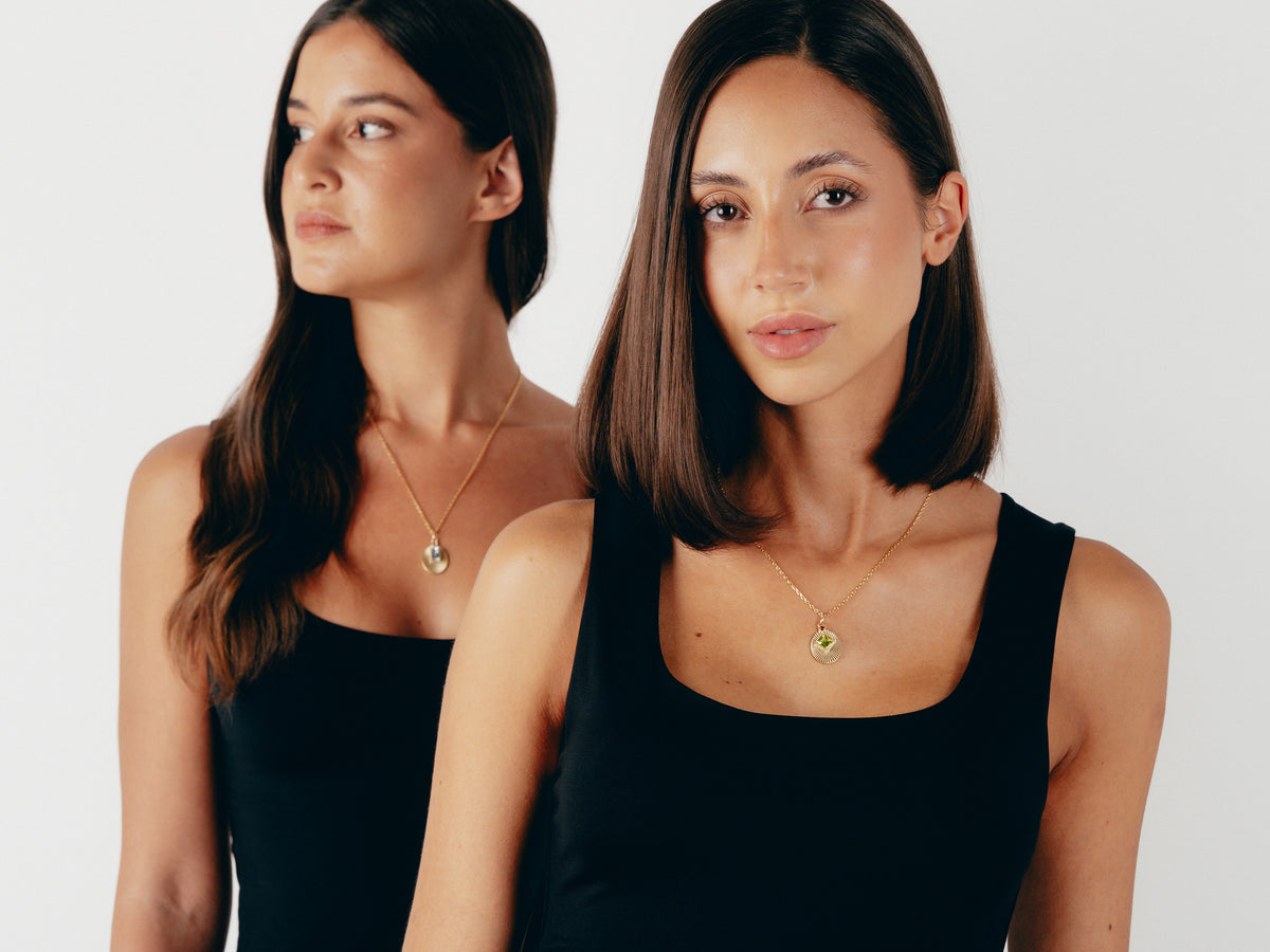 Models wearing VERAE natural stone pendant necklace